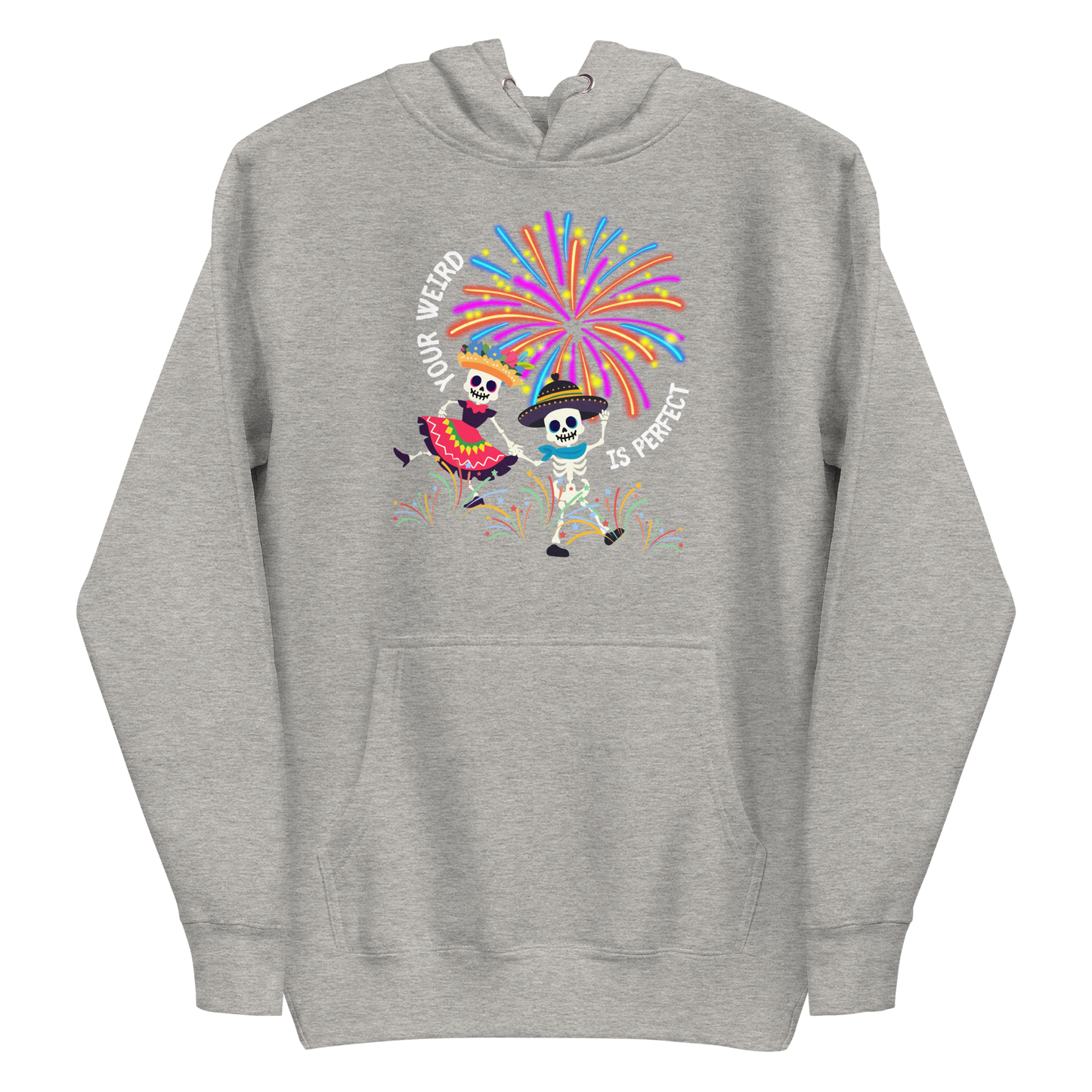 A carbon grey premium hoodie featuring a colorful graphic of two skeletons dancing in festive attire under fireworks. Curved text reads 'YOUR WEIRD IS PERFECT'.