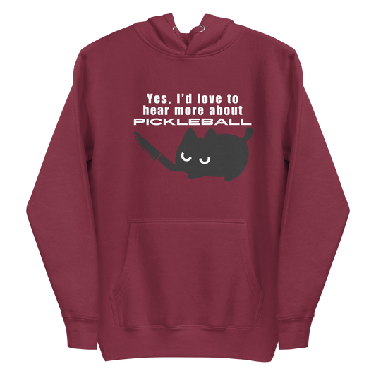 A maroon hoodie featuring a graphic of an angry black cat holding a knife below the sarcastic text: "Yes, I'd love to hear more about PICKLEBALL".