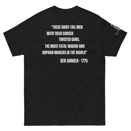 The back of a black t-shirt featuring a vintage-style graphic in Revolutionary War frontier gear holding a rifle. It features a quote from General Arnold about 'Shirt Tail Men' and their 'cursed twisted guns'.