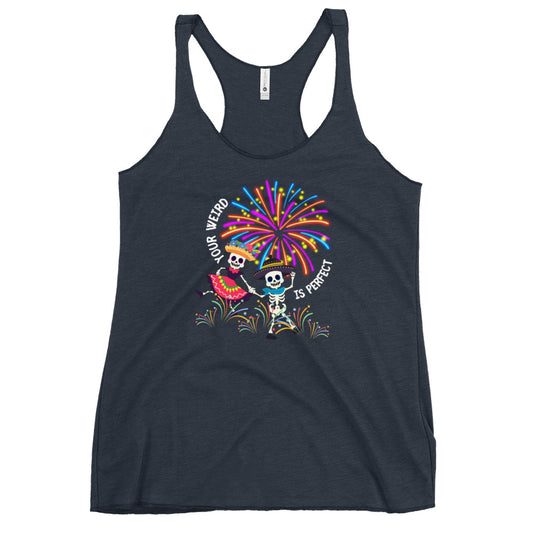 A vintqge navy women's racerback tank top with a colorful graphic print featuring the text 'YOUR WEIRD IS PERFECT' and cartoon skeletons holding hands and smiling, standing underneath exploding colorful fireworks.