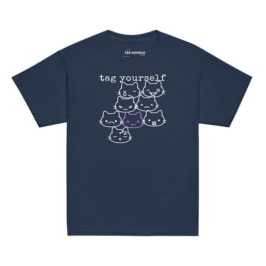 A navy kids t-shirt featuring a 'Tag Yourself' cat mood chart with the smiling cat highlighted.