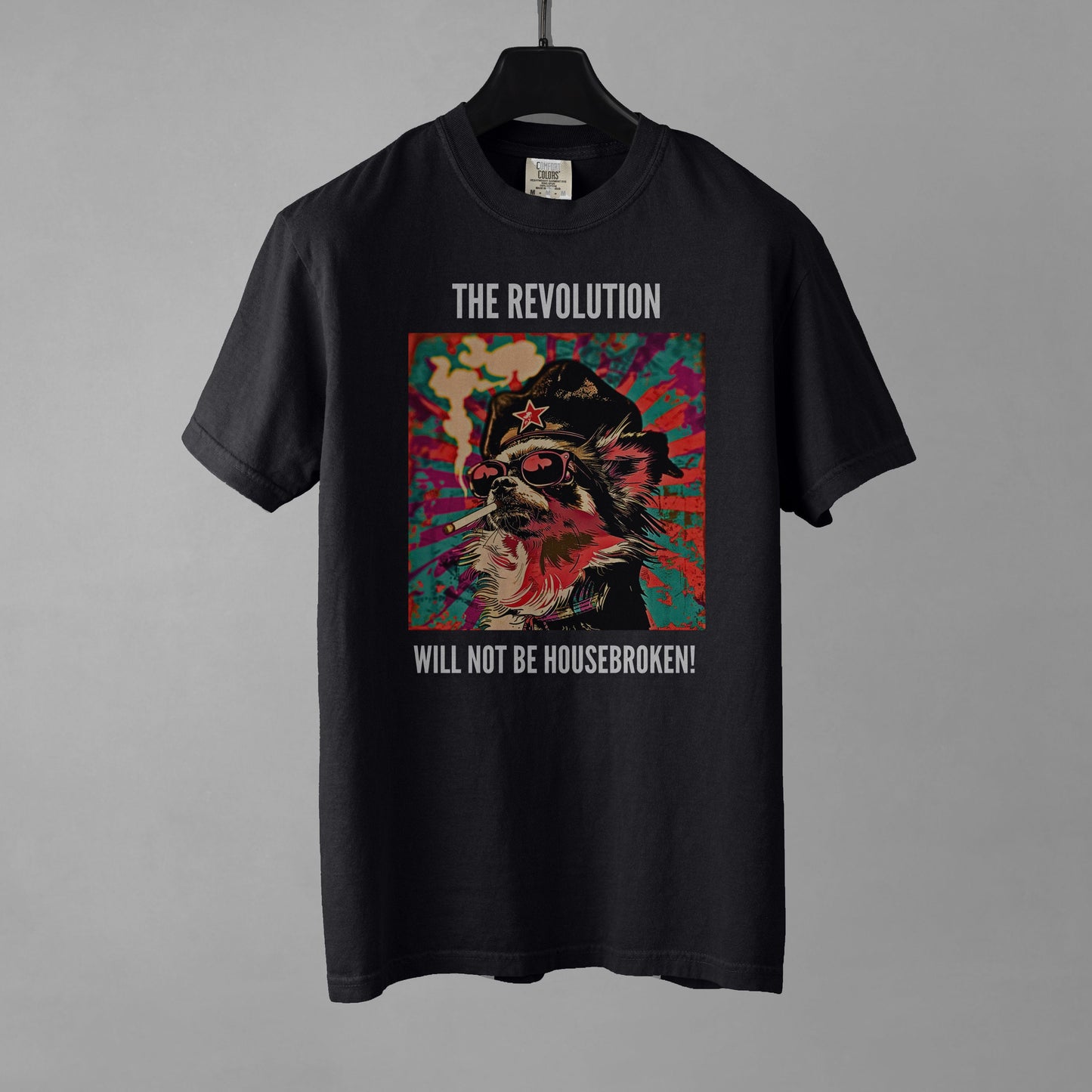 Black t-shirt with colorful graphic and text on a gray background