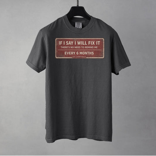 Gray t-shirt with a red and white graphic on a gray background