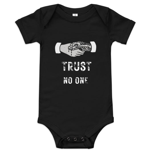 A black baby one-piece featuring the slogan 'Trust No One' in bold, distressed typography.