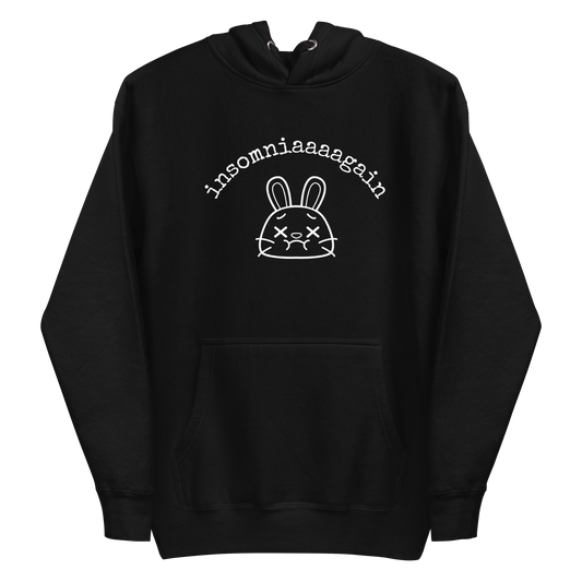 A black women's graphic hoodie featuring a cartoon bunny with tired eyes and the text 'insomniaaaa again'.