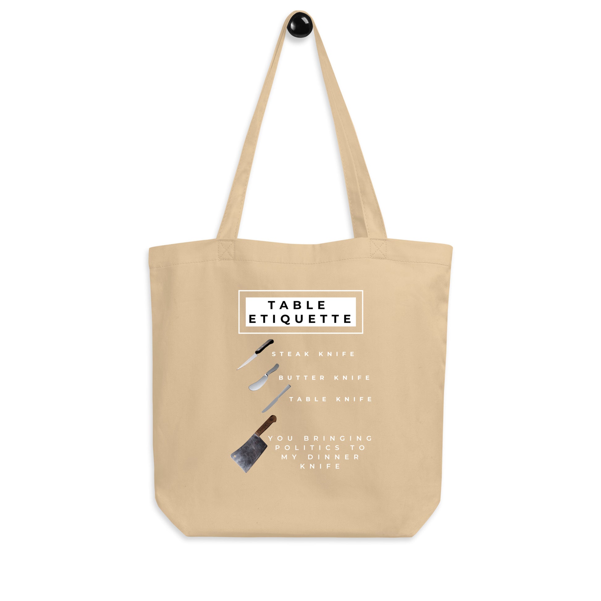 A tan organic cotton tote bag featuring a humorous diagram of table knives and a meat cleaver.