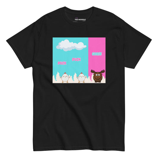 A black women's t-shirt featuring a cartoon graphic. Two white baby chickens are labeled 'DUCK' and 'DUCK', followed by a brown moose labeled 'GOOSE'. The background is split between blue sky and pink.