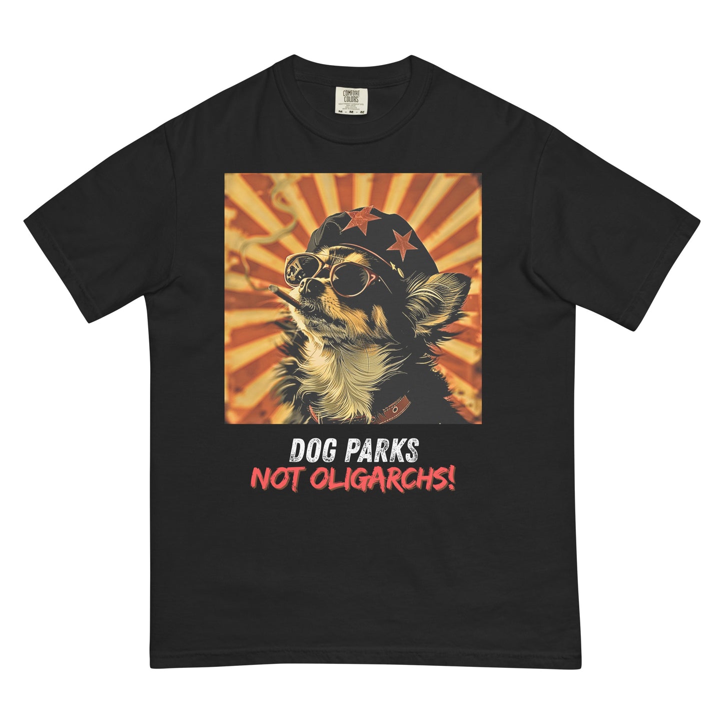 A black colored women's t-shirt with a graphic of a Chihuahua wearing sunglasses and a beret against a 50's style propaganda background with bold all-caps text underneath that reads "DOG PARKS NOT OLIGARCHS".