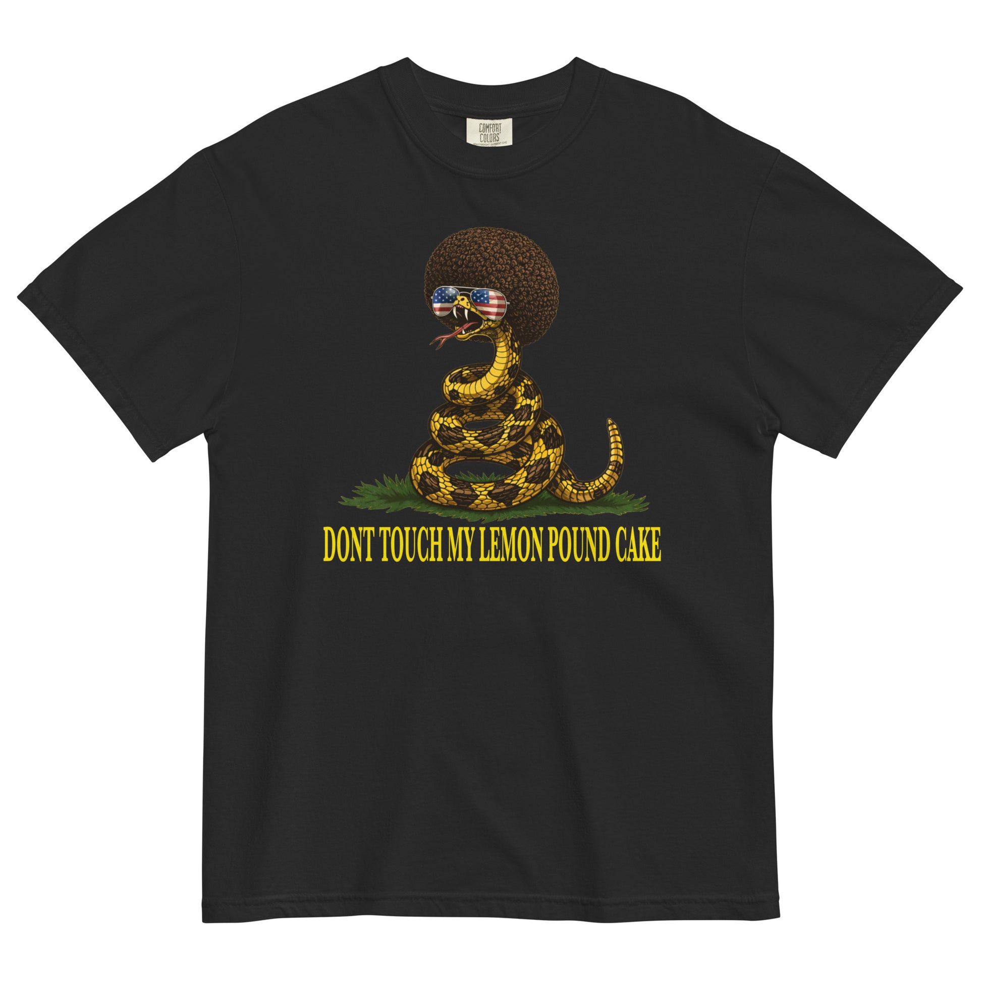 A black graphic t-shirt featuring a coiled rattlesnake with a large brown afro and flag-mirrored sunglasses above yellow text that reads "DONT TOUCH MY LEMON POUND CAKE."