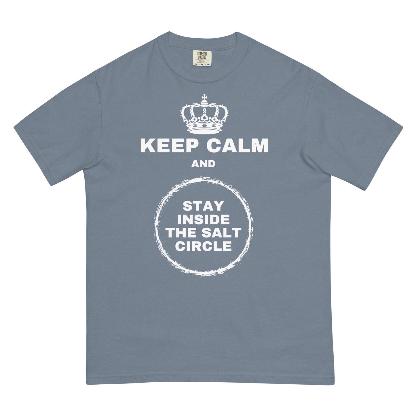 A blue jean colored t-shirt with a crown graphic over top of bold all-caps text that reads 'KEEP CALM AND STAY INSIDE THE SALT CIRCLE, with a white circular graphic to represent a 'salt circle'. 