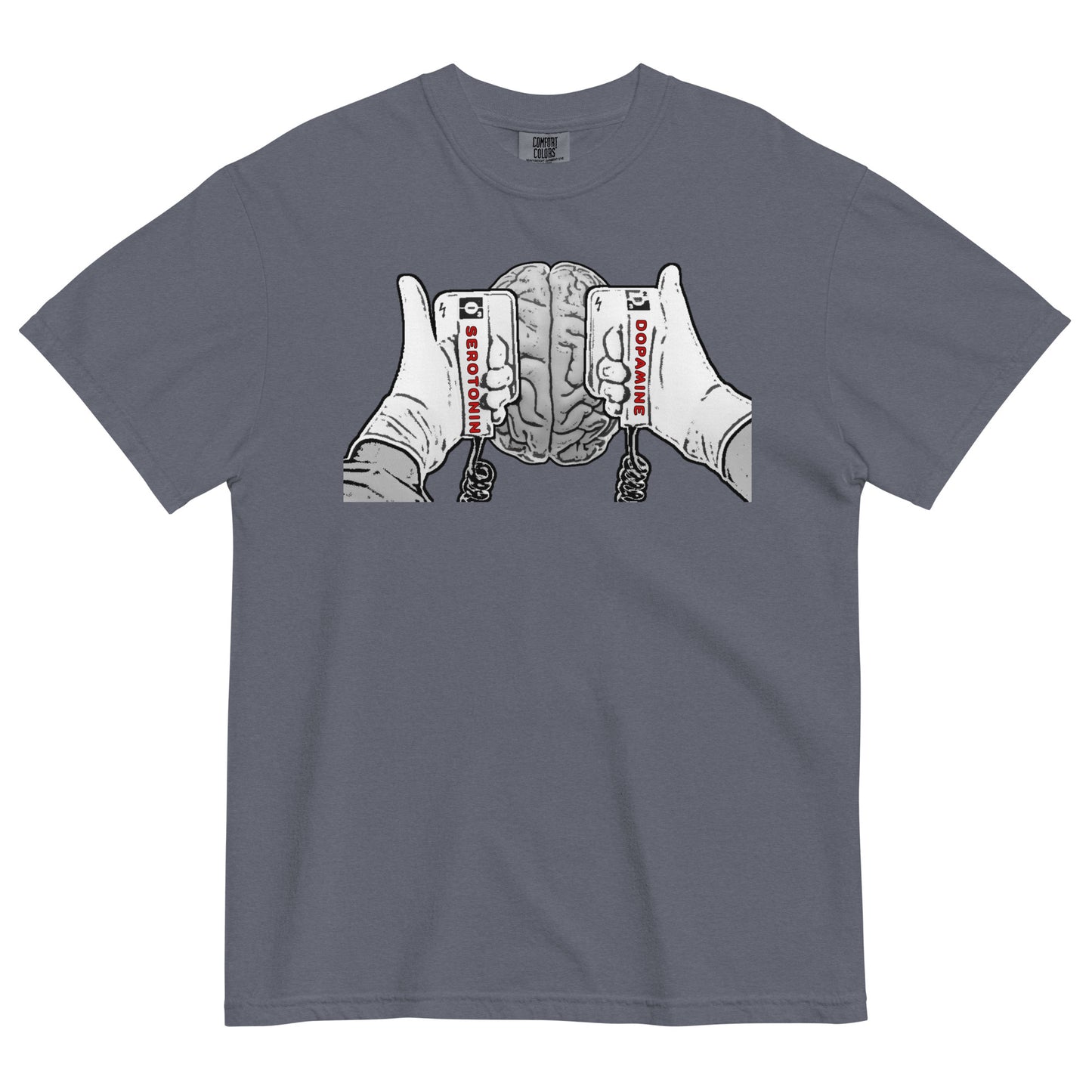 A denim colored t-shirt with a black and white line drawing graphic on the chest that shows a brain beneath two hands holding defibrillator paddles. The left paddle is labelled Serotonin and the right paddle is labelled Dopamine.  