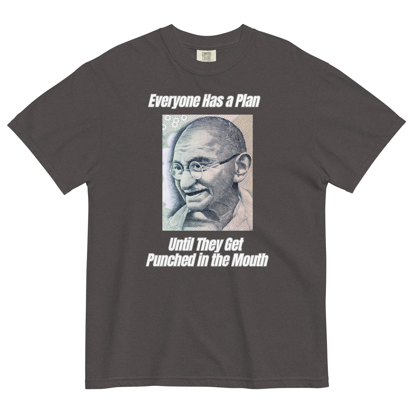A graphite colored t-shirt featuring a vintage portrait of Mahatma Gandhi ironically paired with the famous quote 'Everyone Has a Plan Until They Get Punched in the Mouth'