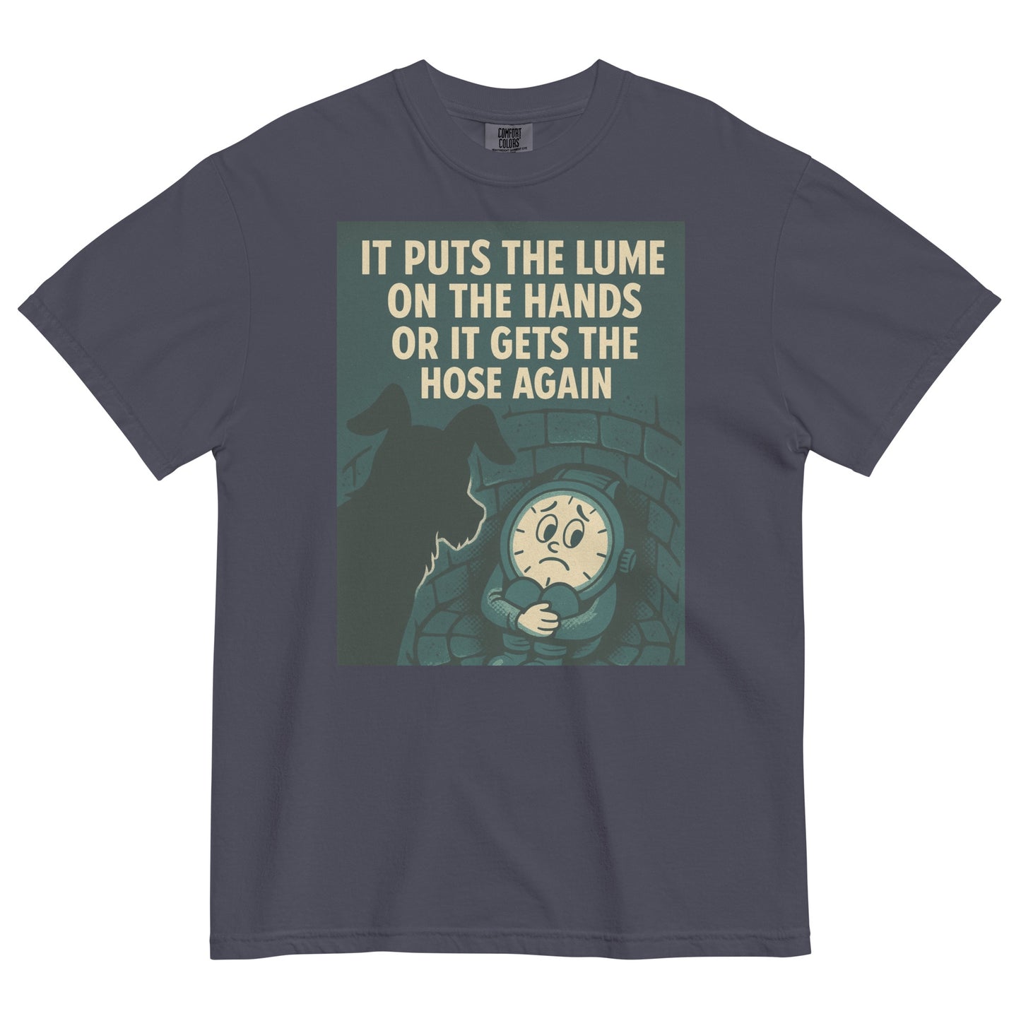 A navy colored t-shirt with a chest graphic in dark grayish green with a cream colored line drawing of an anamorphic watch face sitting at the bottom of a brick lined well with its knees drawn up to its chest, held by its arms. Looking down into the well is the silhouette of a small dog. The top of the graphic shows the text, in all caps, 'IT PUTS THE LUME ON THE HANDS OR IT GETS THE HOSE AGAIN'.