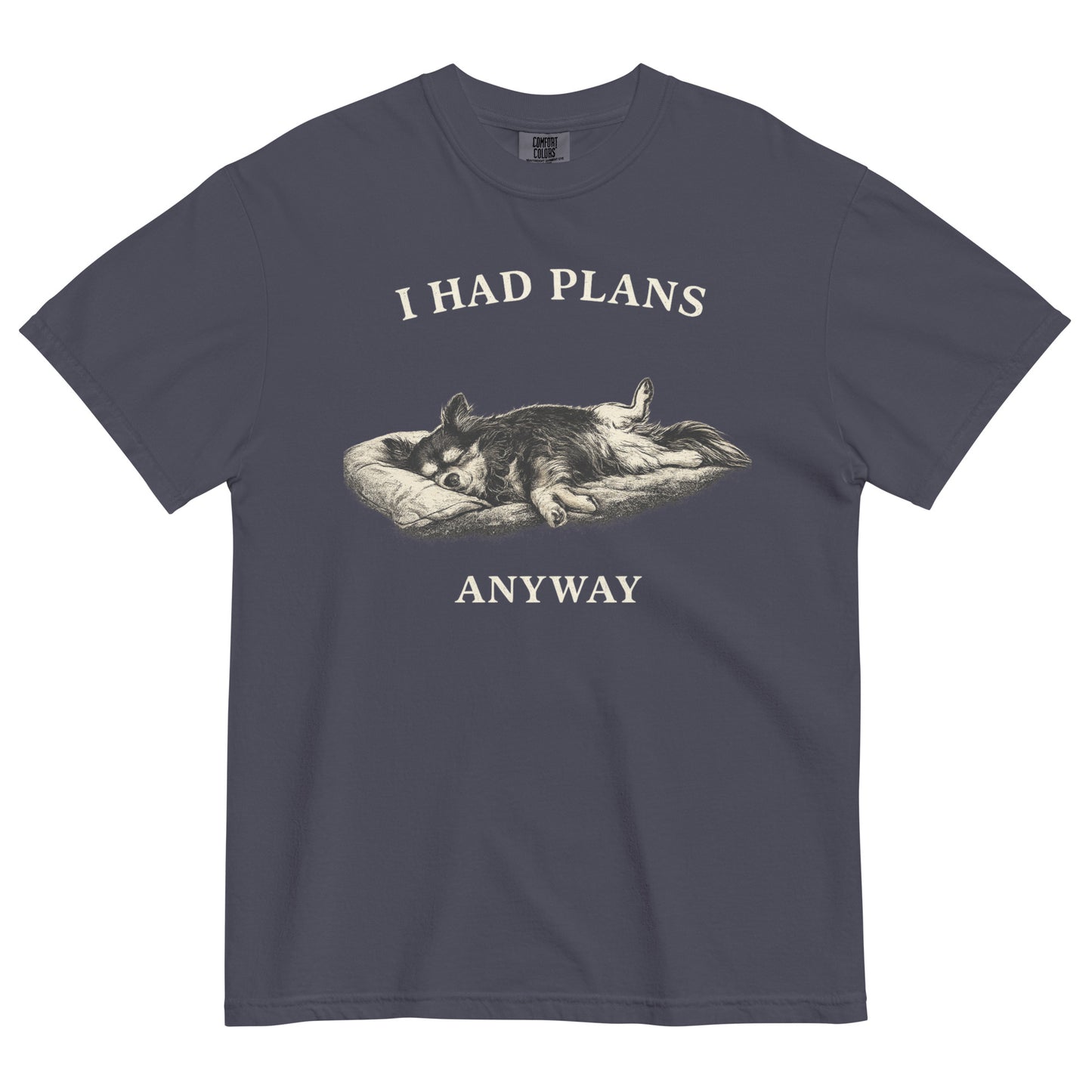 A navy blue colored t-shirt featuring a monochrome illustration of a long-haired Chihuahua sleeping deeply on its back in a dog bed, with rear legs splayed open and forepaws crossed. Above the illustration in bold, white capital letters is the text 'I HAD PLANS', and below it reads 'ANYWAY'.