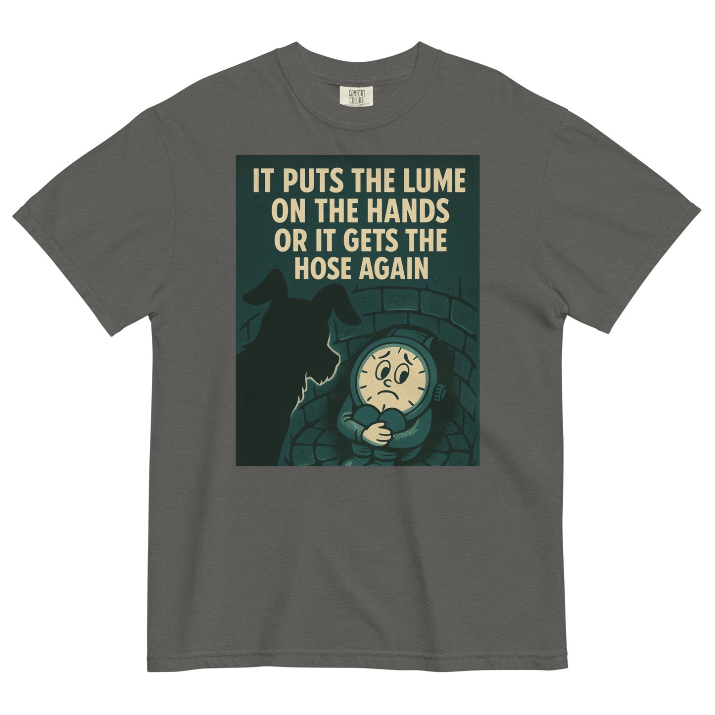 A pepper colored t-shirt with a chest graphic in dark grayish green with a cream colored line drawing of an anamorphic watch face sitting at the bottom of a brick lined well with its knees drawn up to its chest, held by its arms. Looking down into the well is the silhouette of a small dog. The top of the graphic shows the text, in all caps, 'IT PUTS THE LUME ON THE HANDS OR IT GETS THE HOSE AGAIN'.