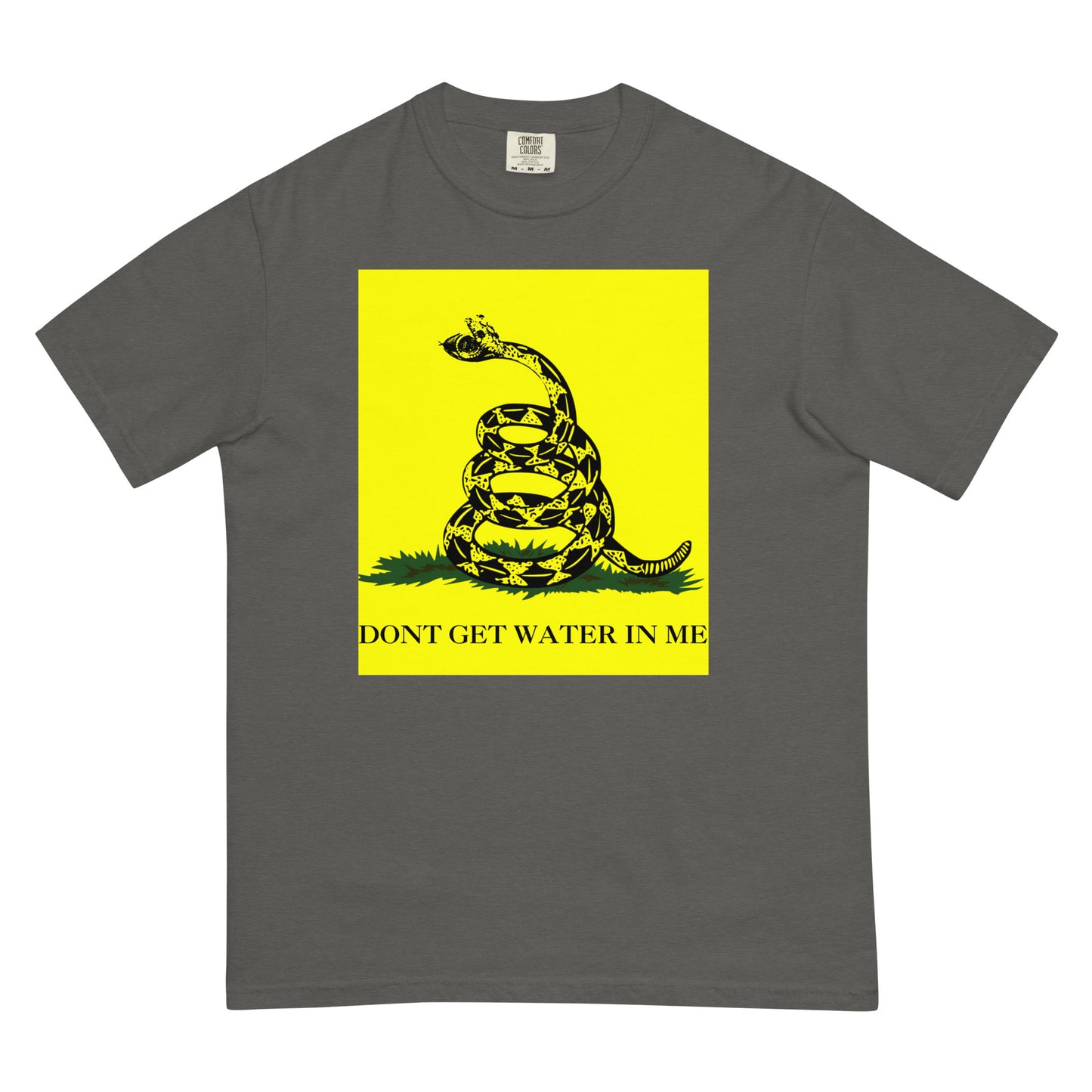 A pepper colored t-shirt with a yellow Gadsden Flag style graphic featuring a snake on a bed of grass. Under the bed of grass is the all-caps text, 'DON'T GET WATER IN ME'. The snakes jaws are open to reveal a watch face. 