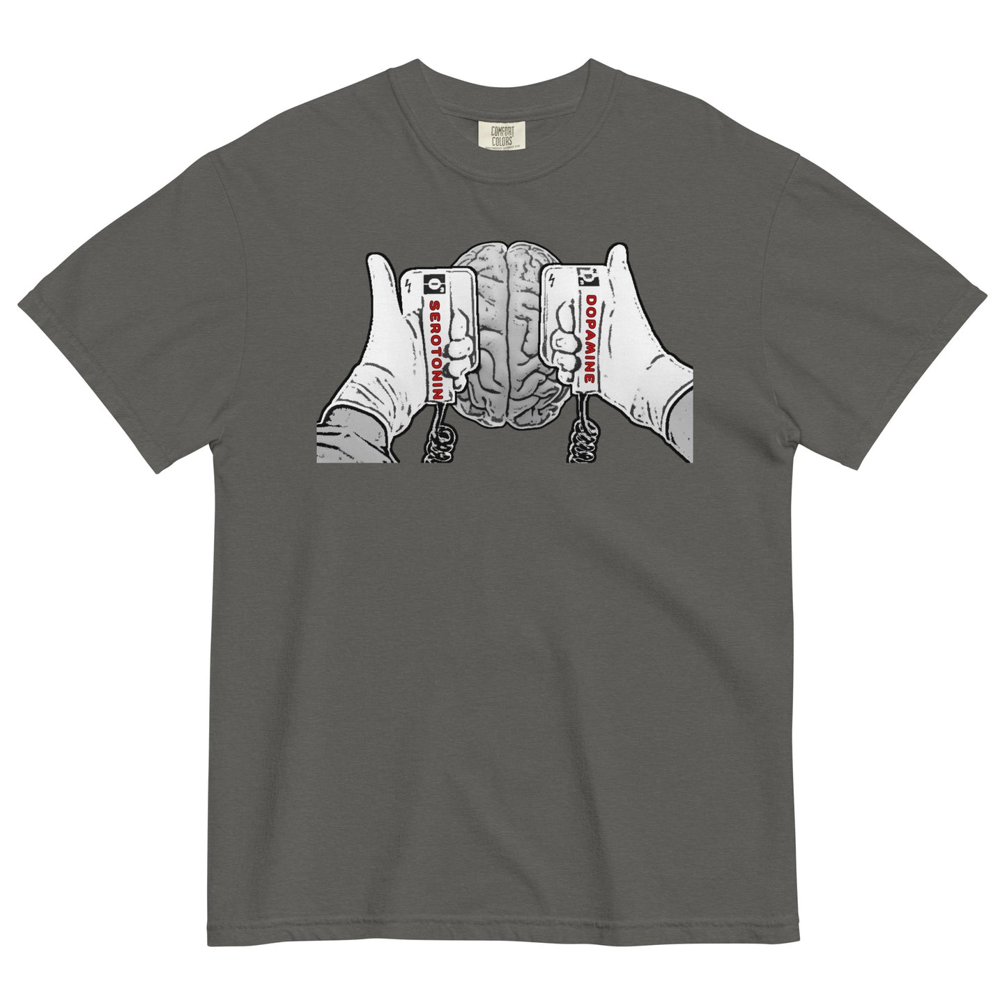 A pepper colored t-shirt with a black and white line drawing graphic on the chest that shows a brain beneath two hands holding defibrillating paddles. The left paddle is labelled Serotonin and the right paddle is labelled Dopamine.  