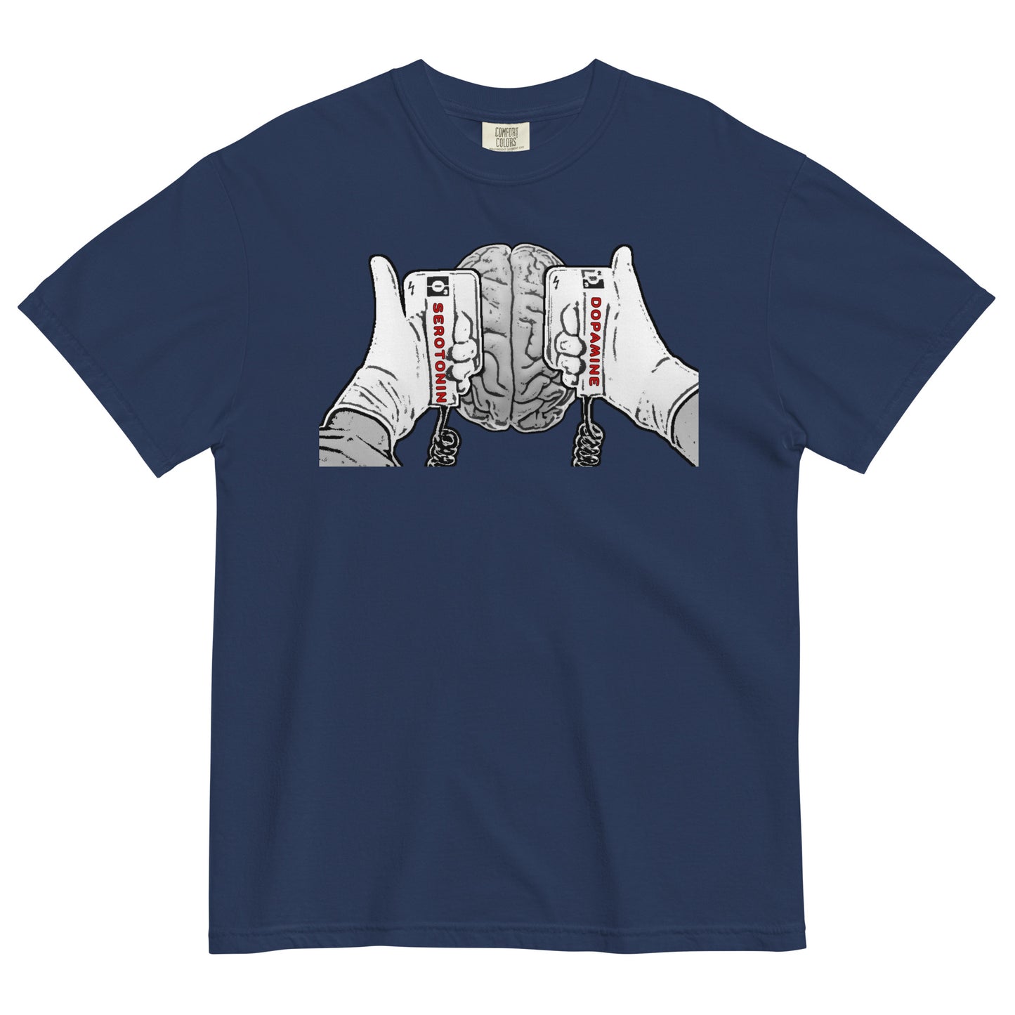 A true navy t-shirt with a black and white line drawing graphic on the chest that shows a brain beneath two hands holding defibrillating paddles. The left paddle is labelled Serotonin and the right paddle is labelled Dopamine.  