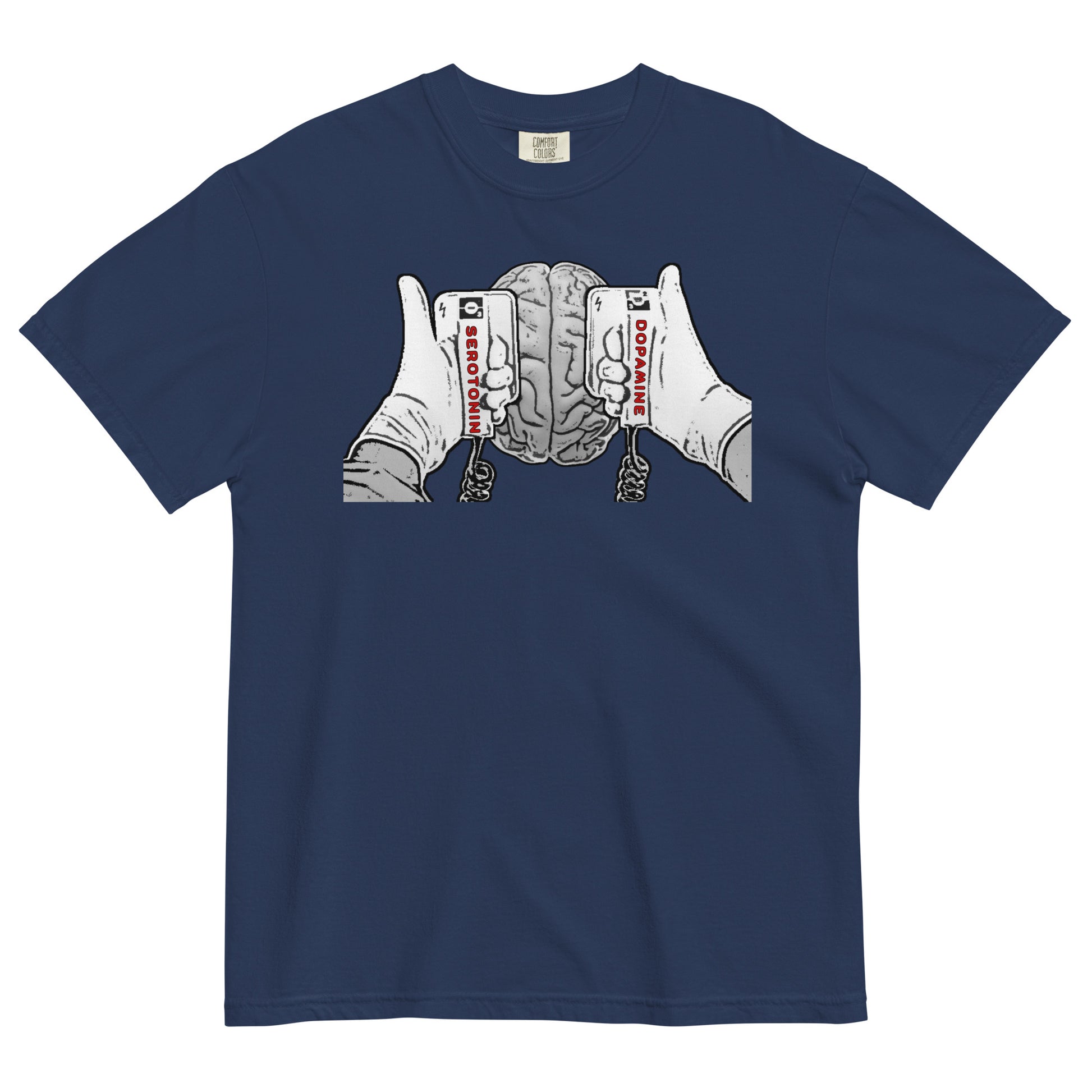 A true navy t-shirt with a black and white line drawing graphic on the chest that shows a brain beneath two hands holding defibrillating paddles. The left paddle is labelled Serotonin and the right paddle is labelled Dopamine.  