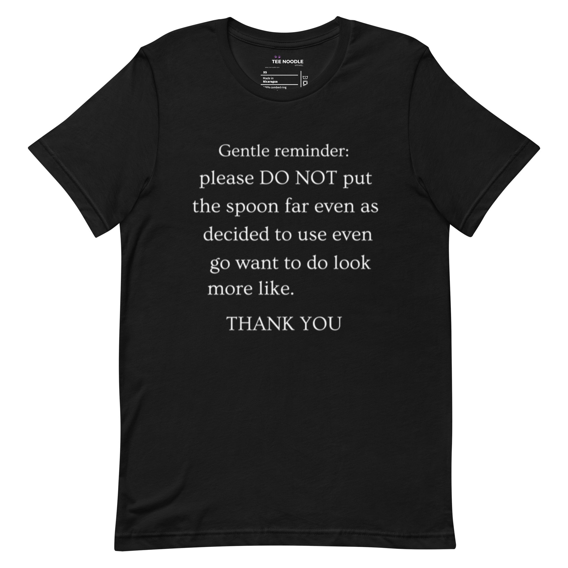 A black women's t-shirt featuring a sign that reads 'Gentle reminder please DO NOT put the spoon far even as decided to use even go want to do look more like THANK YOU'.