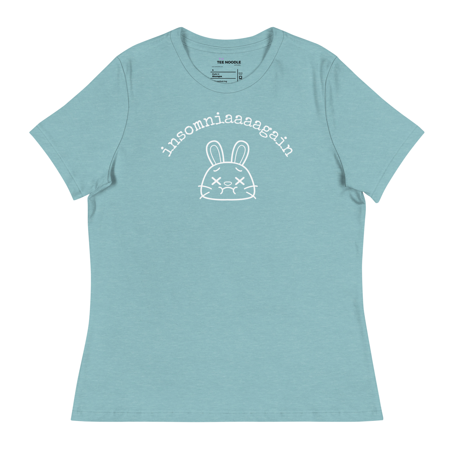 A heather blue lagoon women's relaxed t-shirt featuring a cartoon bunny with tired eyes and the text 'insomniaaaagain'.