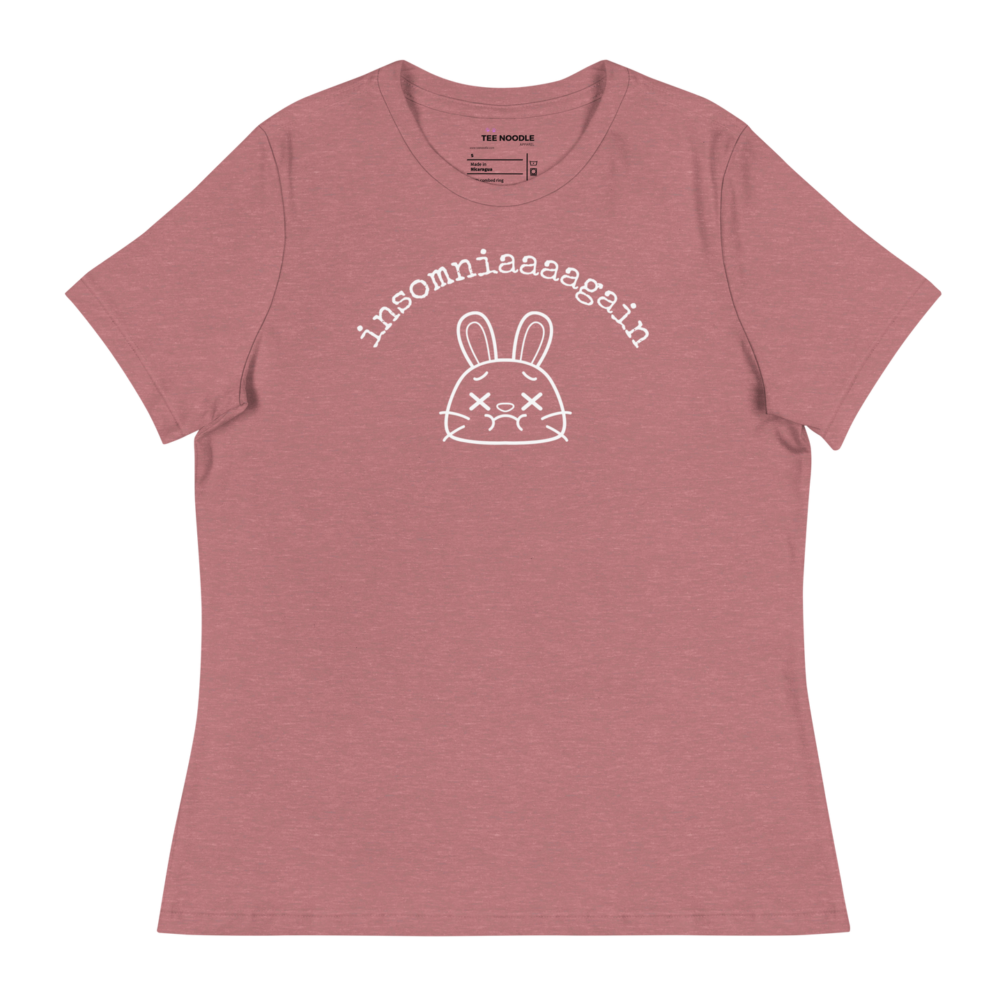 A heather mauve women's relaxed t-shirt featuring a cartoon bunny with tired eyes and the text 'insomniaaaagain'.