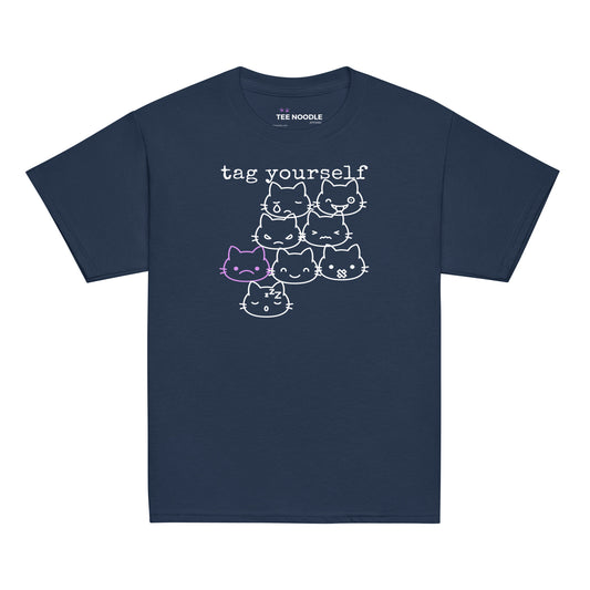 A navy kids t-shirt featuring a 'Tag Yourself' cat mood chart with the frowning cat highlighted.
