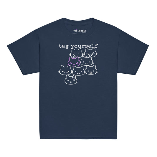 A navy kids t-shirt featuring a 'Tag Yourself' cat mood chart with the angry cat highlighted.